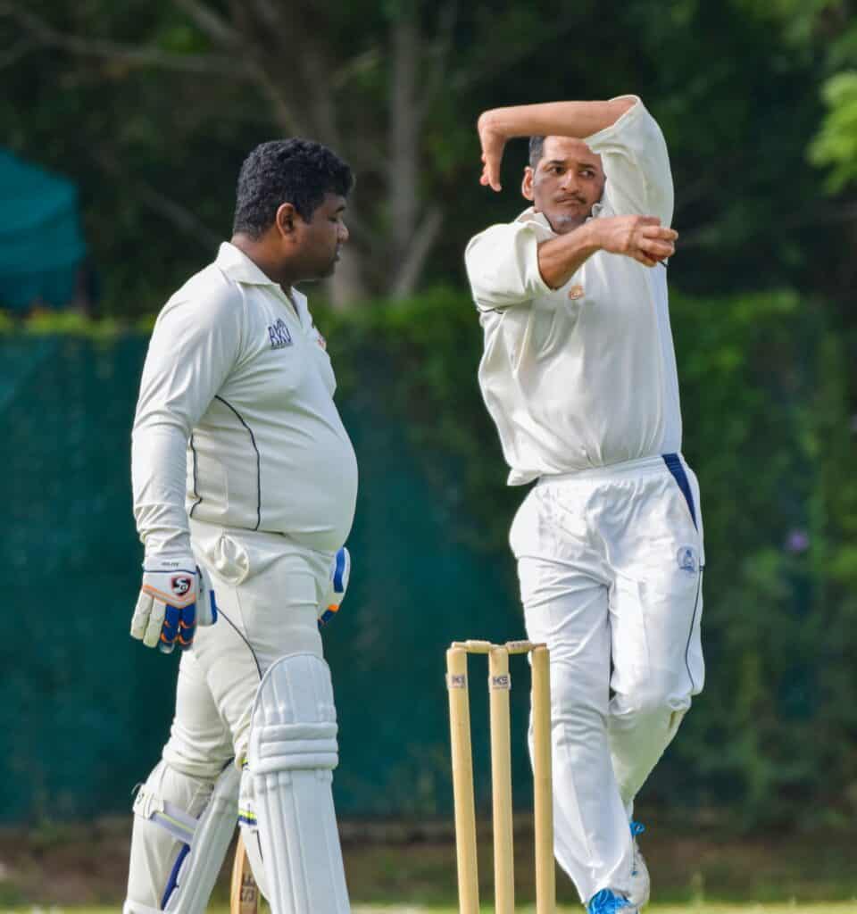 a bowler bowling maiden over in cricket